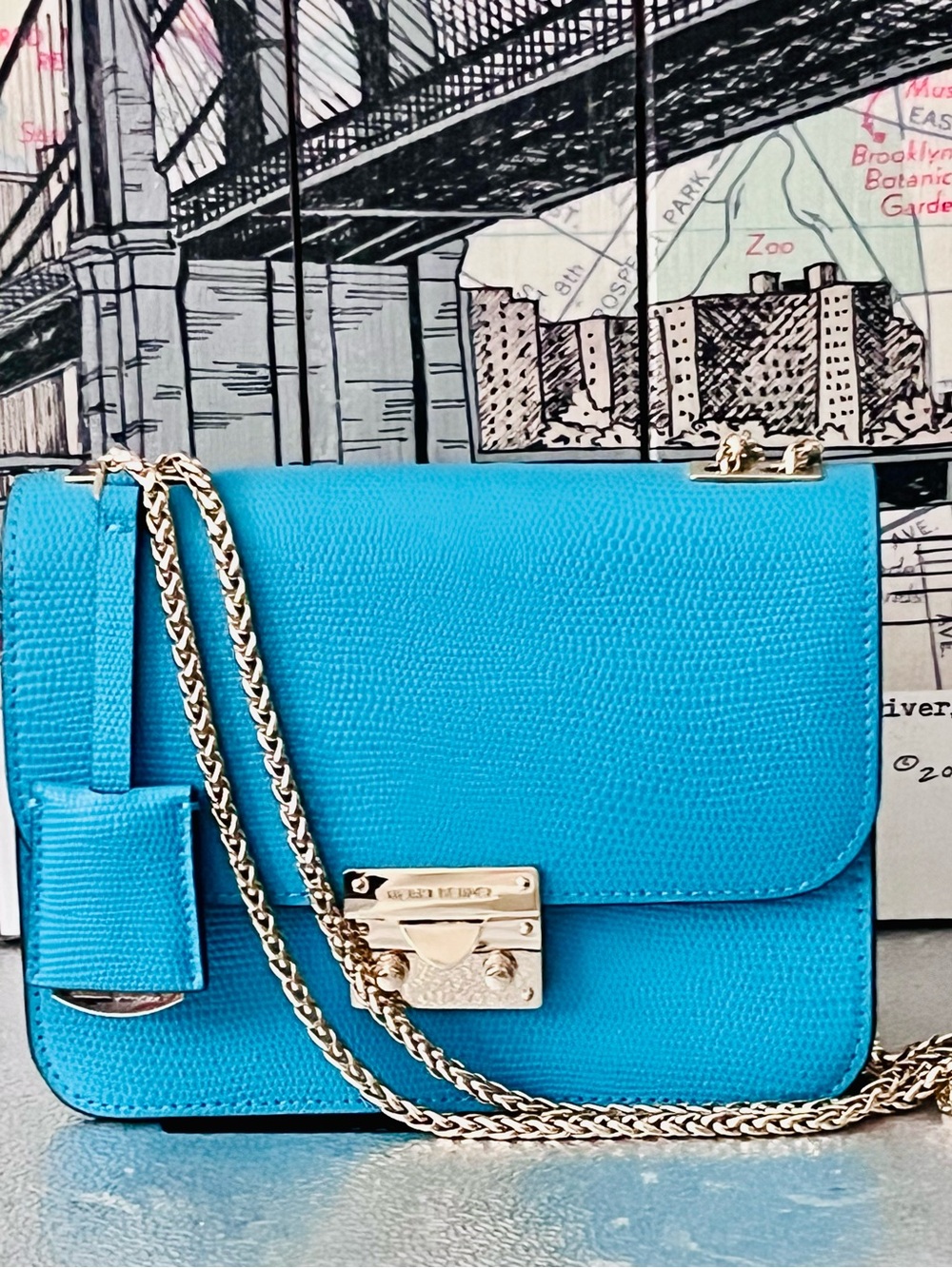 BNWOT. Henri Bendel Saffiano Blue Leather Crossbody Bag with Gold Chain